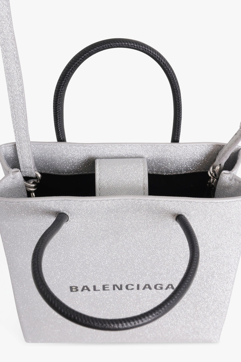 SHOPPING SPARKLING PHONE HOLDER SILVER – Parlour X