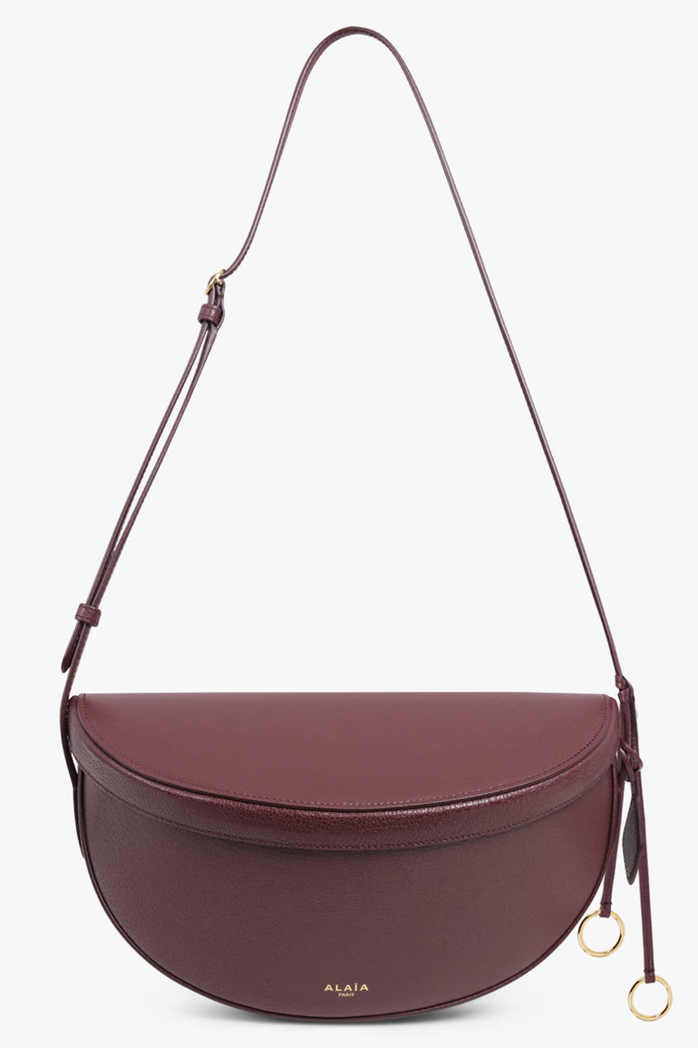 ALAIA BAGS Burgundy / Garnet Red Hip East West Crossbody Bag | Garnet Red