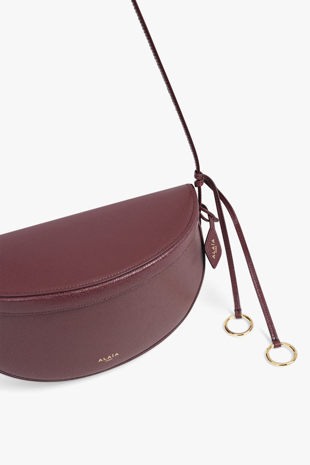 ALAIA BAGS Burgundy / Garnet Red Hip East West Crossbody Bag | Garnet Red
