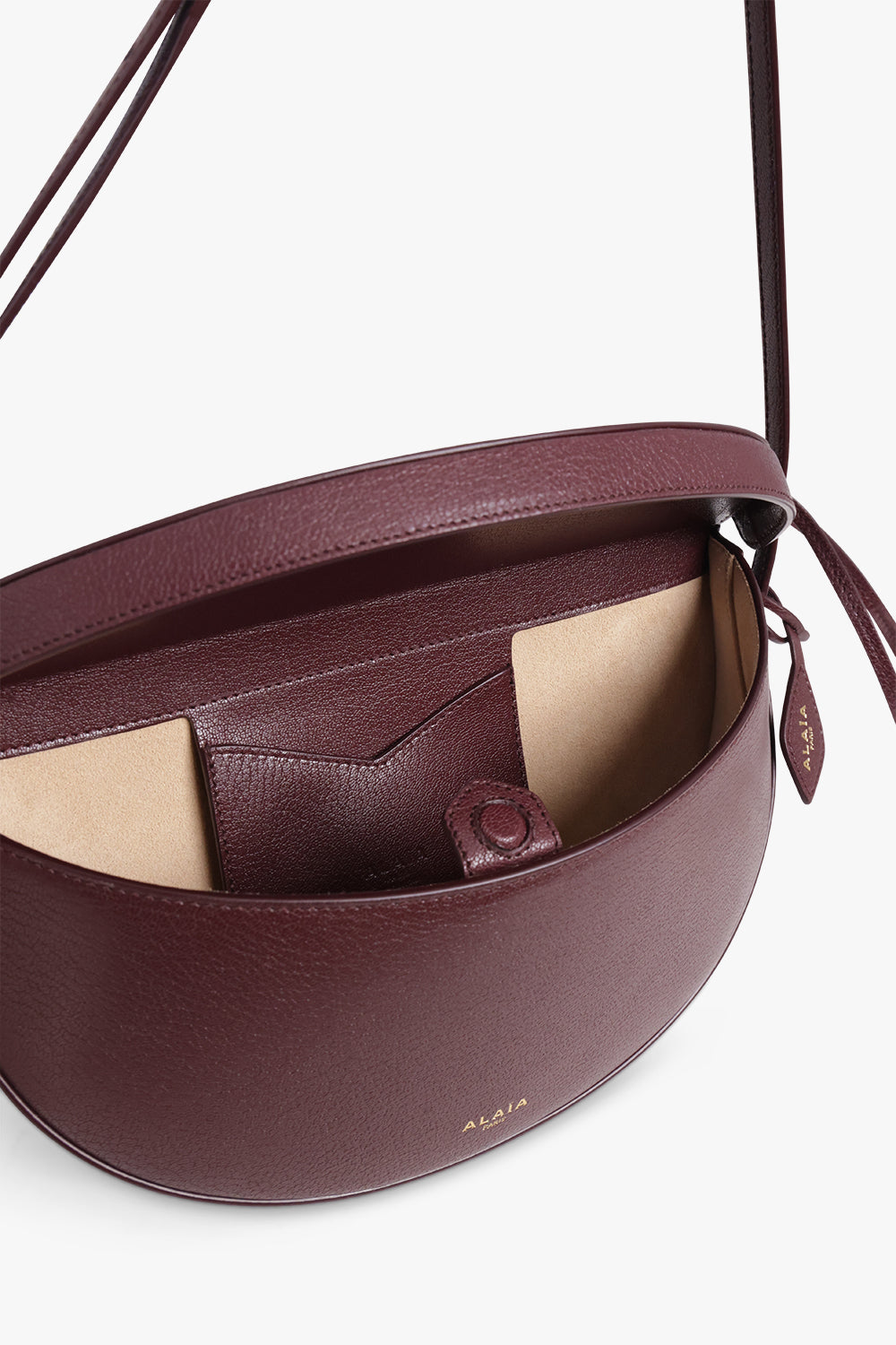 ALAIA BAGS Burgundy / Garnet Red Hip East West Crossbody Bag | Garnet Red