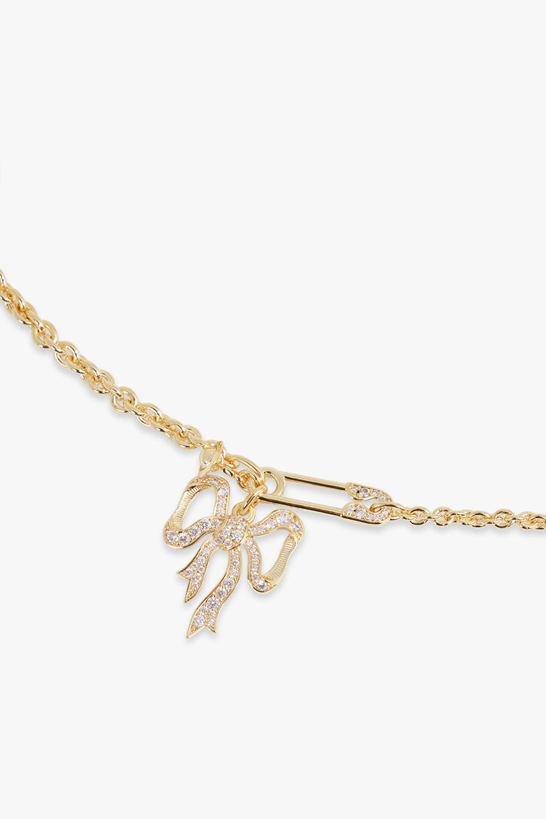VIVIENNE WESTWOOD JEWELLERY GOLD / Gold Lilith Bow X Safety Pin Pendant Necklace | Gold