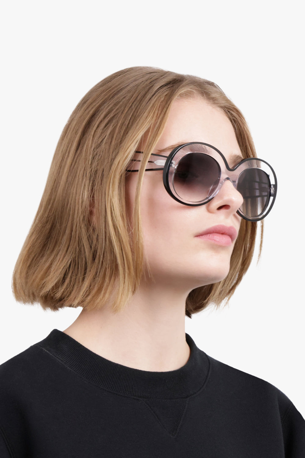 ALAIA ACCESSORIES CLEAR / CLEAR/BLACK / ONE SIZE AA0063S Round Sunglasses | Clear/Black
