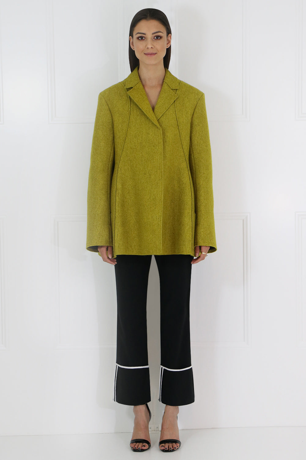 JIL SANDER RTW SCULPTURAL FLARED JACKET OCHRE