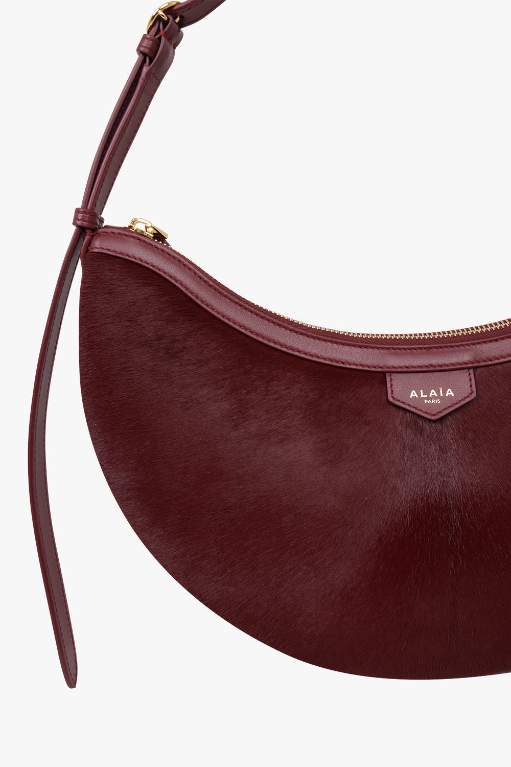 Alaïa Demi Lune Hair Calf Bag in Garnet Red