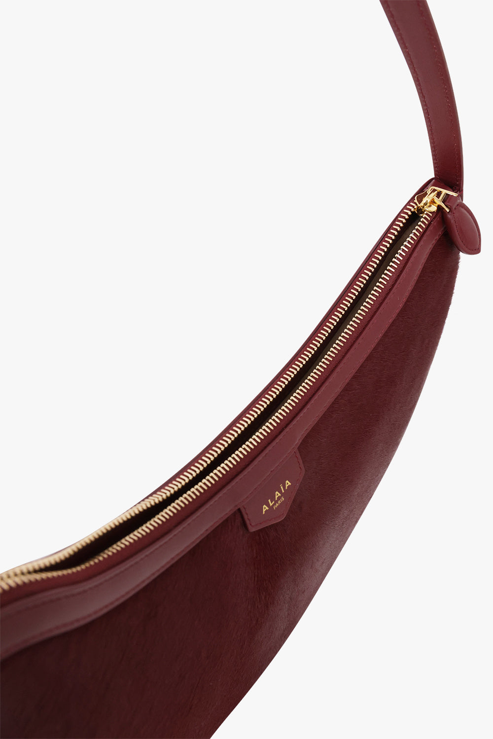 Alaïa Demi Lune Hair Calf Bag in Garnet Red
