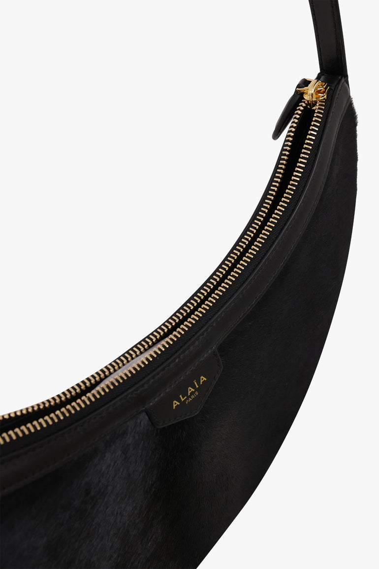 Alaïa Demi Lune Hair Calf Bag in Black