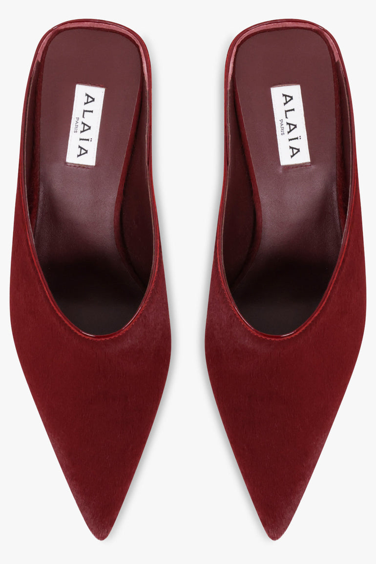 Alaïa Wedge 75mm Calf Hair Mules in Cherry Red