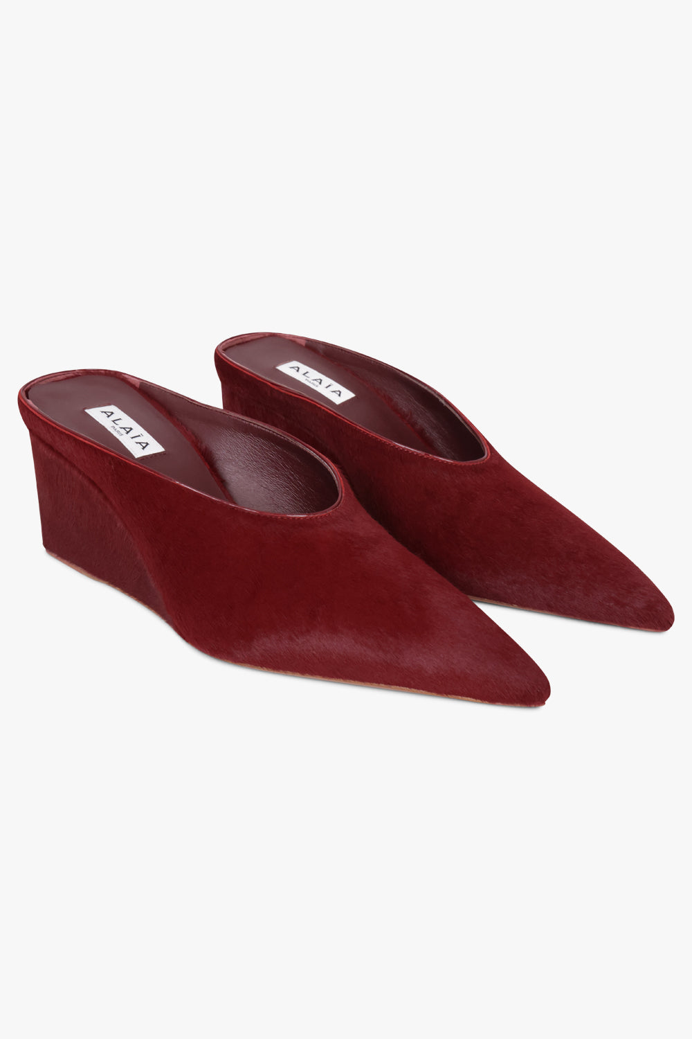 Alaïa Wedge 75mm Calf Hair Mules in Cherry Red