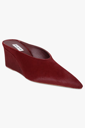 Alaïa Wedge 75mm Calf Hair Mules in Cherry Red