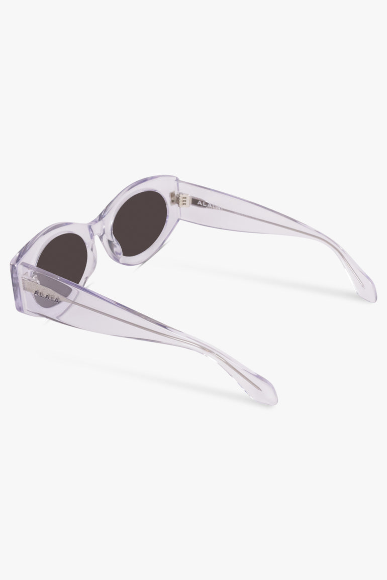 ALAIA SUNGLASSES CLEAR / Clear/Black AA0080S Round Sunglasses | Clear/Black